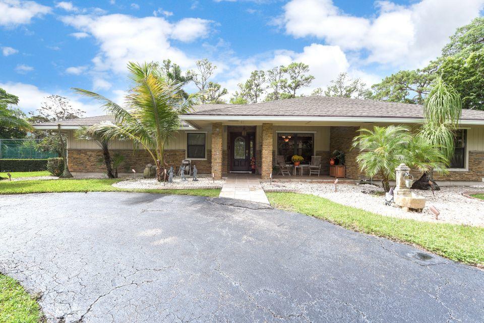 6438 Gun Club Road West Palm Beach, FL 33415 - Photo 3 of 44 Front 02