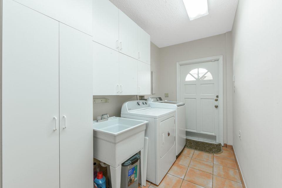6438 Gun Club Road West Palm Beach, FL 33415 - Photo 39 of 44 Laundry 01