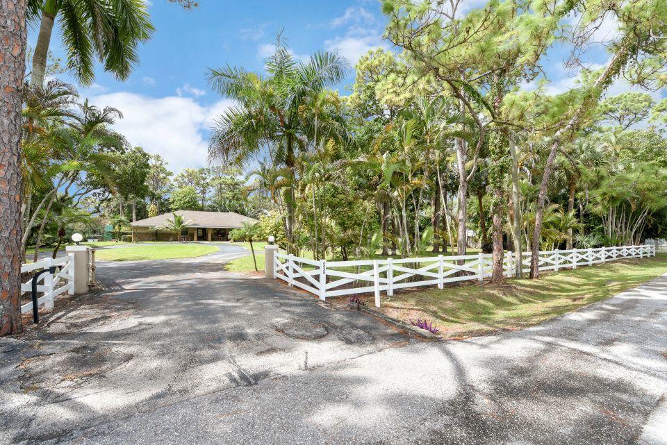 6438 Gun Club Road West Palm Beach, FL 33415 - Photo 4 of 44 Front 04