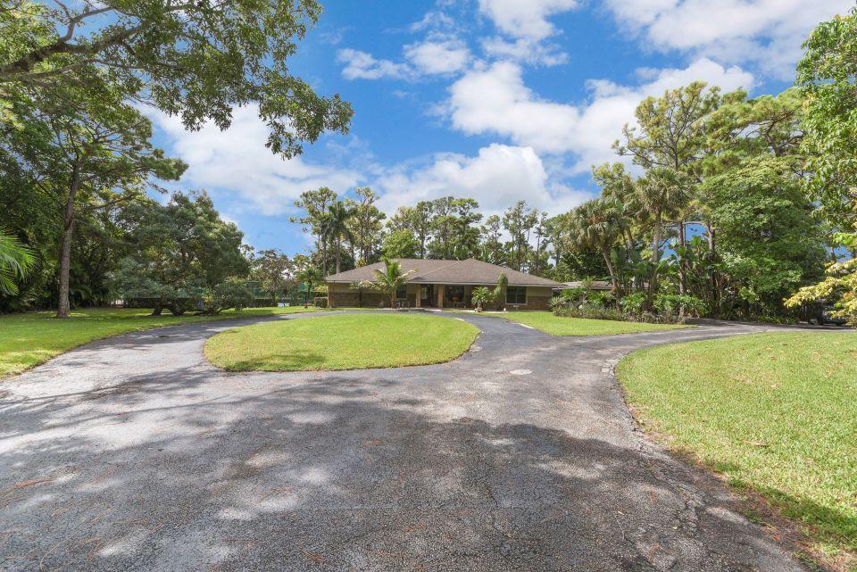 6438 Gun Club Road West Palm Beach, FL 33415 - Photo 44 of 44 Front 03