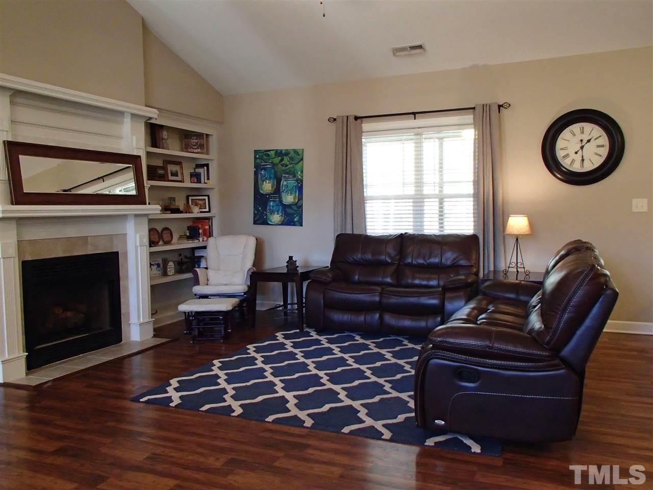 2183 Matthews Road Clayton, NC 27520 - Photo 12 of 25 The family room is roomy, warm and inviting.