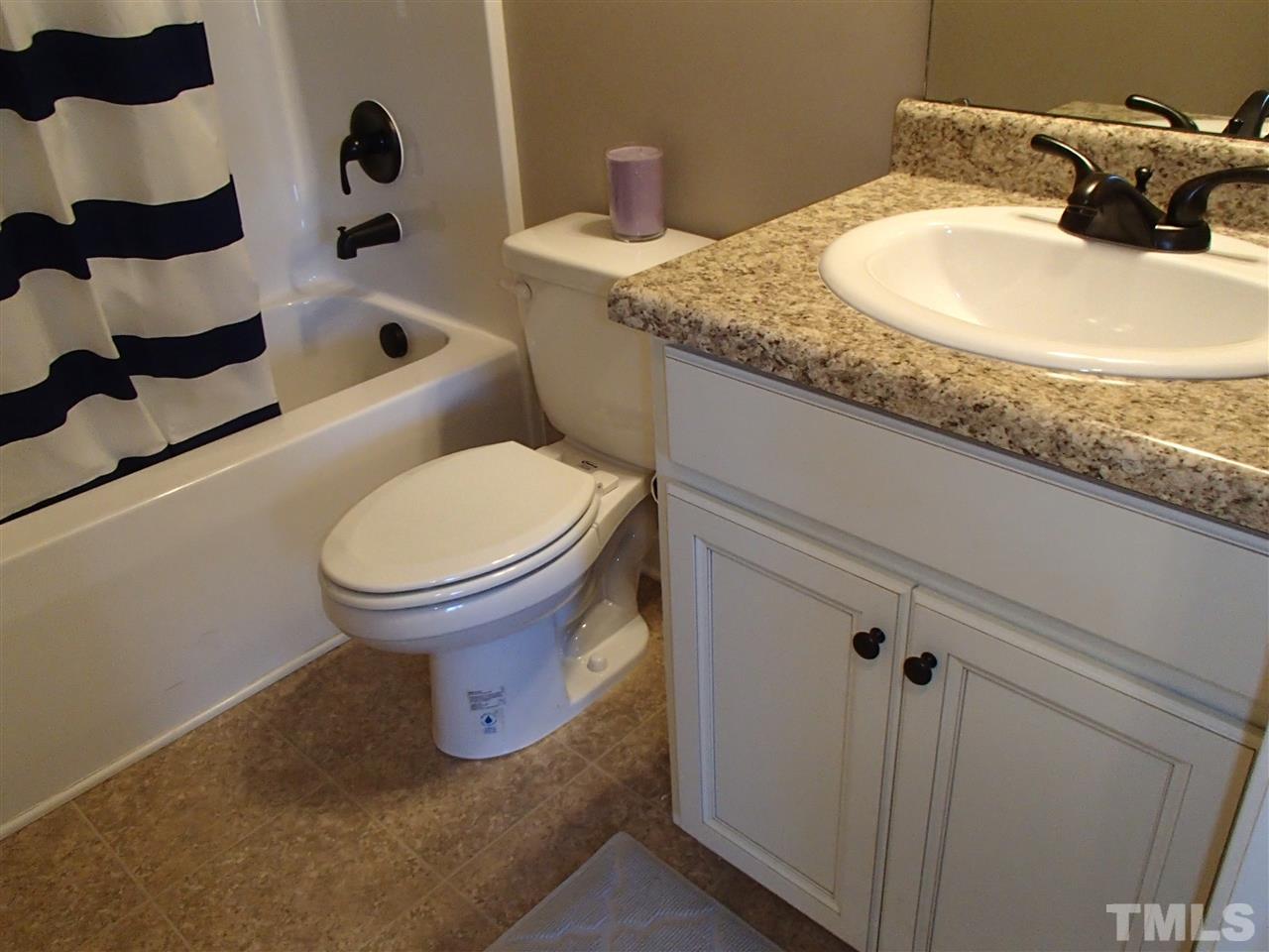 2183 Matthews Road Clayton, NC 27520 - Photo 18 of 25 Two FULL baths make life easier for you and your guests.
