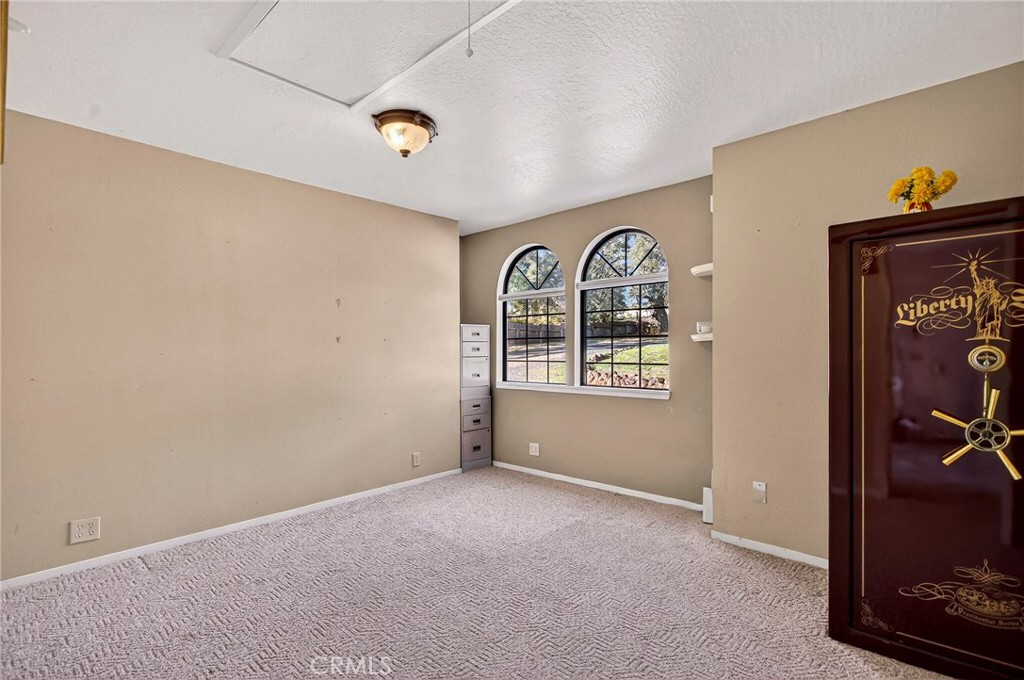 142 Honey Run Road Chico, CA 95928 - Photo 16 of 28 a view of an empty room with a window