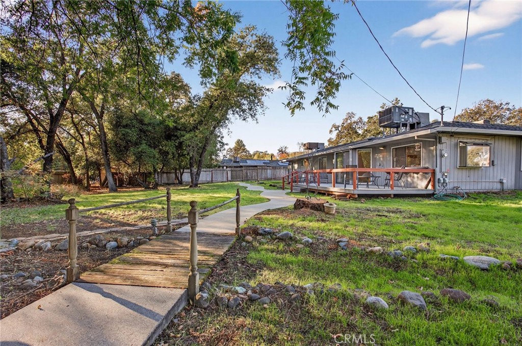 142 Honey Run Road Chico, CA 95928 - Photo 19 of 28 a view of a house with a swimming pool