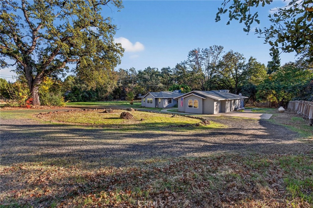 142 Honey Run Road Chico, CA 95928 - Photo 2 of 28 a view of a swimming pool with a yard