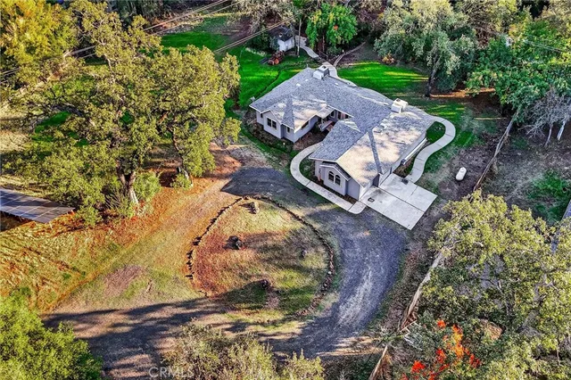 an aerial view of residential building with ocean view