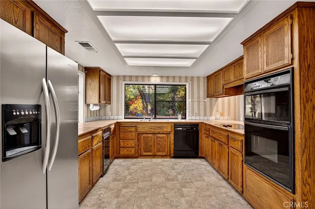 a view of a livingroom with furniture and window