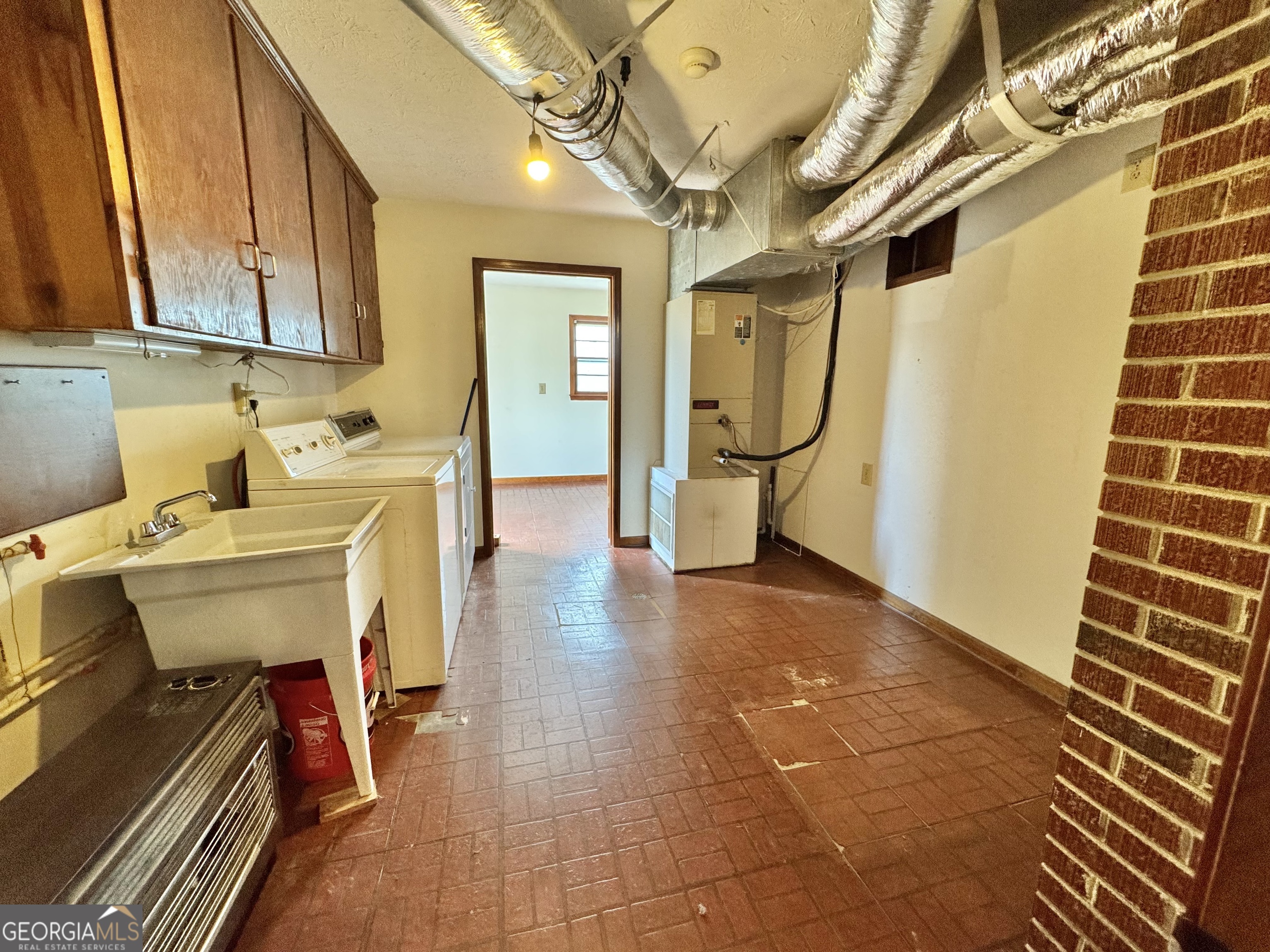 1760 Fears Road Rutledge, GA 30663 - Photo 29 of 68 a view of a patio with table and chairs