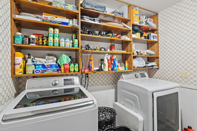 a view of a room with workspace and a window