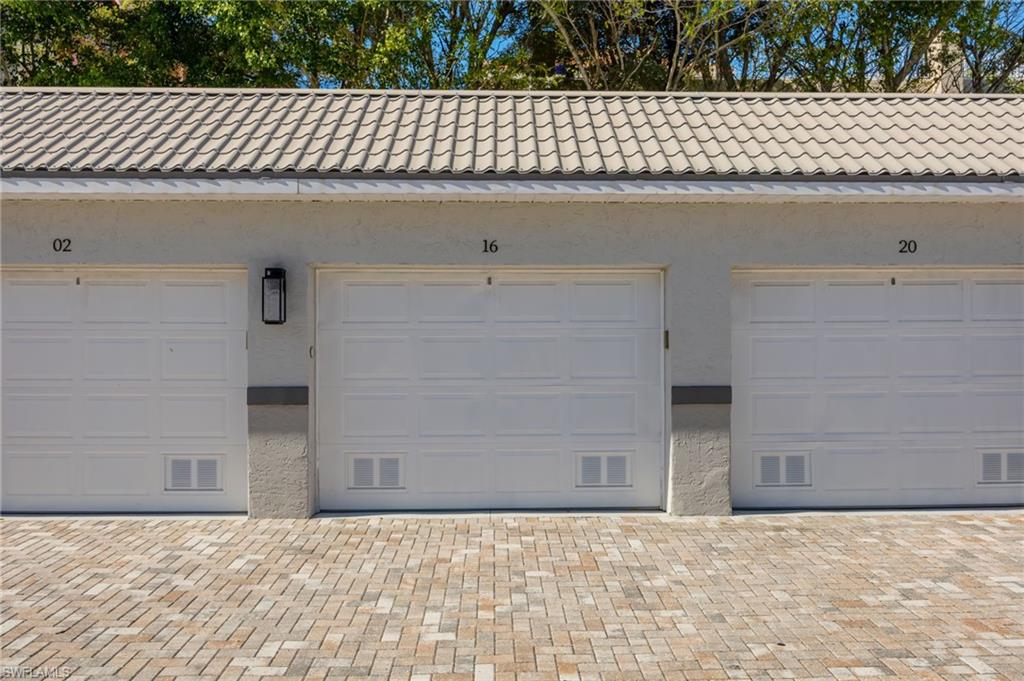 309 Goodlette-Frank Road, Unit A406 Naples, FL 34102 - Photo 13 of 14 a backyard of a house