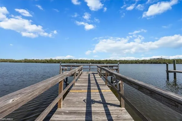 a view of wooden floor with a lake