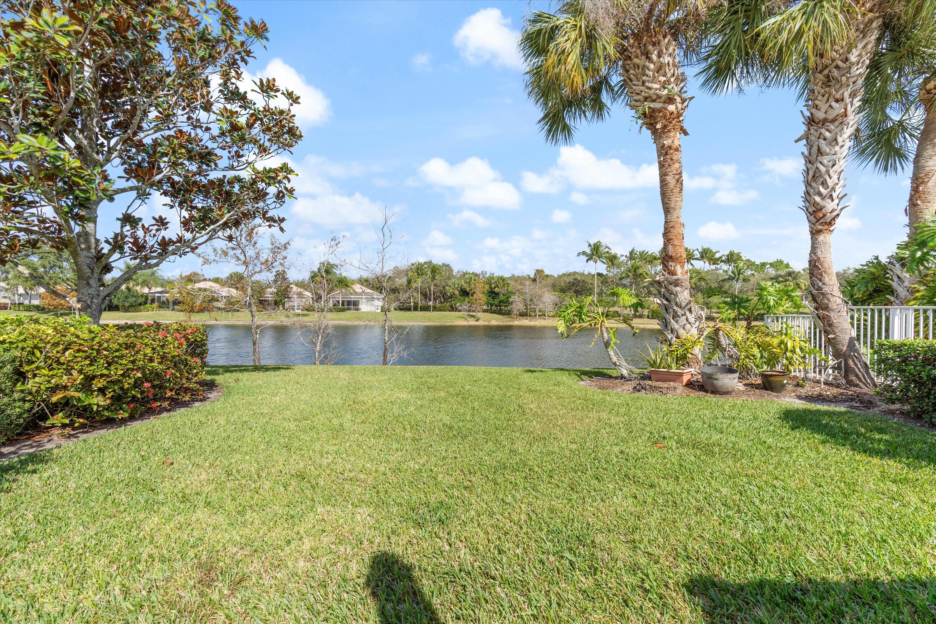 8255 Quito Place Wellington, FL 33414 - Photo 21 of 23 a view of a garden with houses