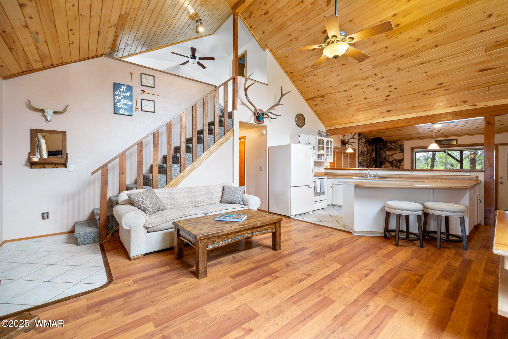 3154 Aspen Road Overgaard, AZ 85933 - Photo 8 of 36 a living room with furniture and a wooden floor