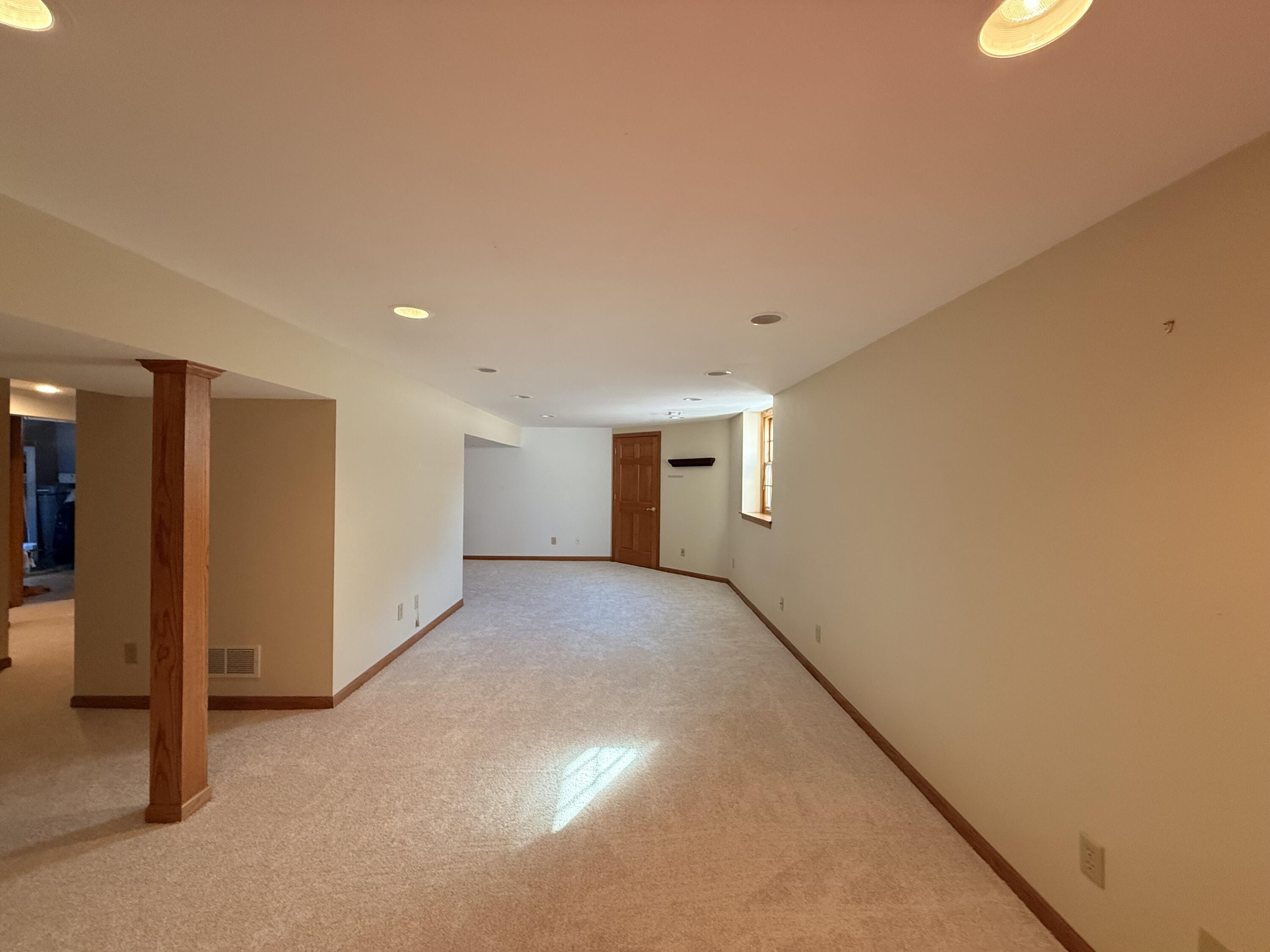 S85W19635 Colonial Court Muskego, WI 53150 - Photo 15 of 19 Lower level family room