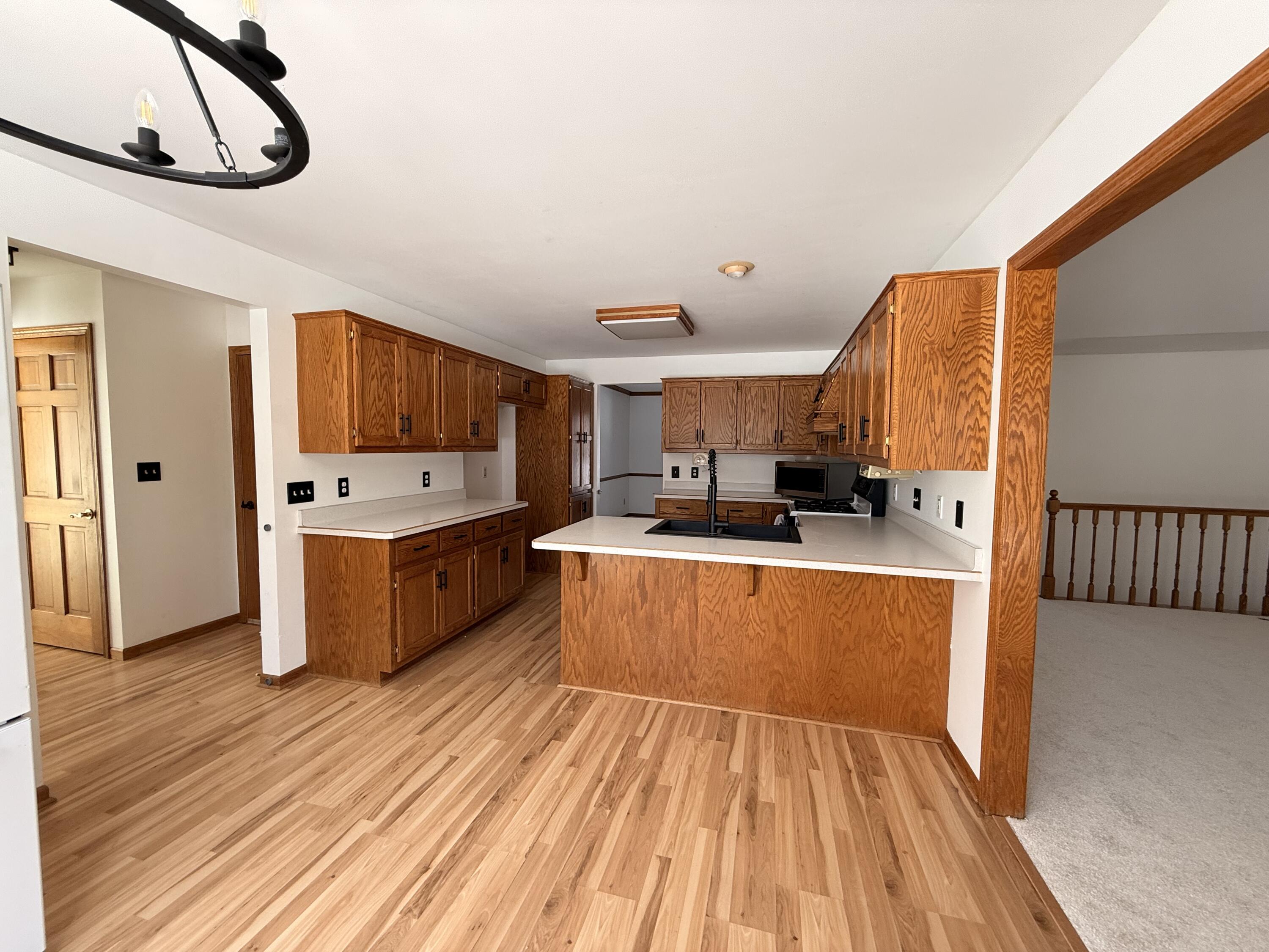 S85W19635 Colonial Court Muskego, WI 53150 - Photo 6 of 19 Kitchen