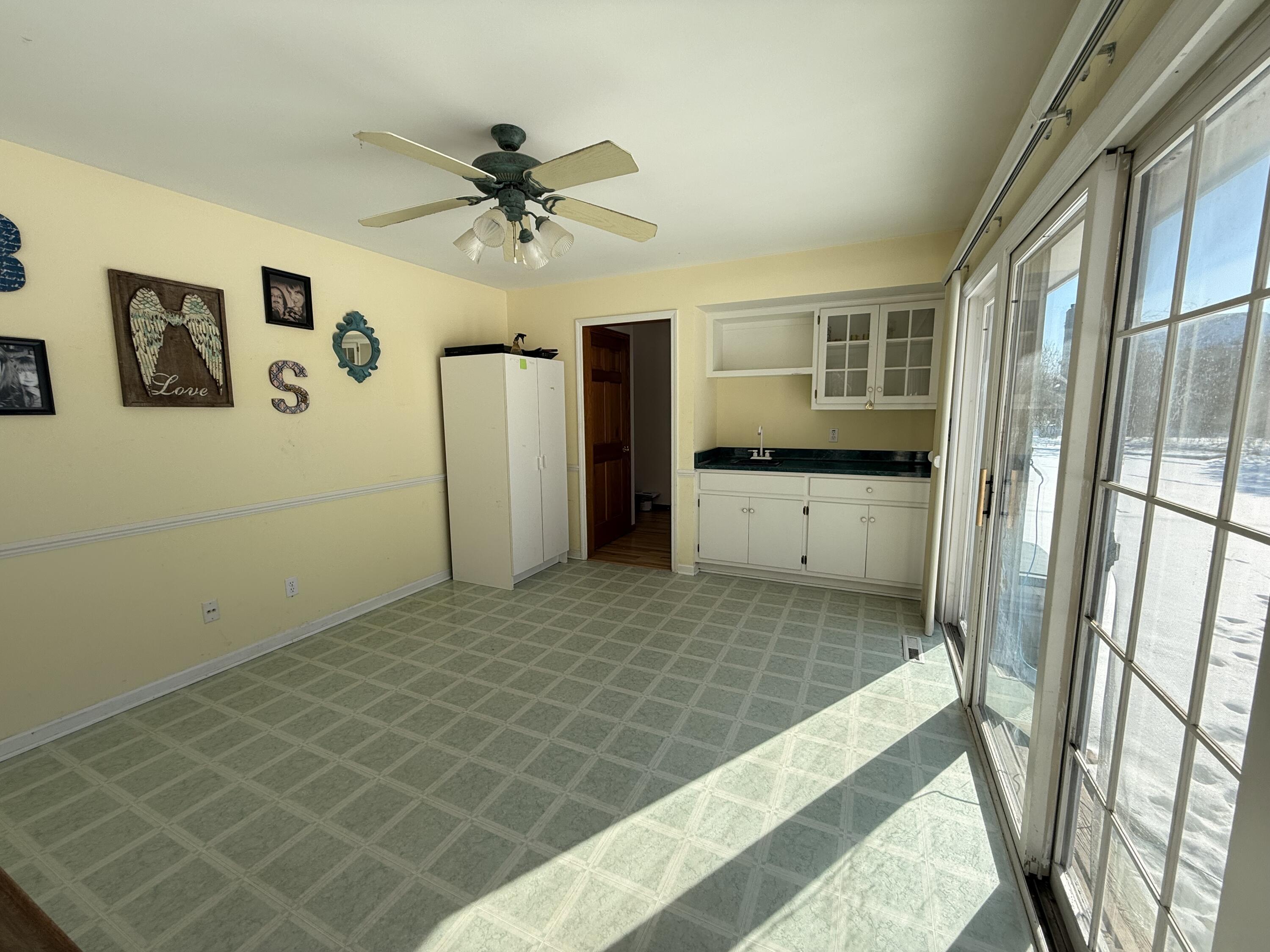 S85W19635 Colonial Court Muskego, WI 53150 - Photo 10 of 19 4 season room