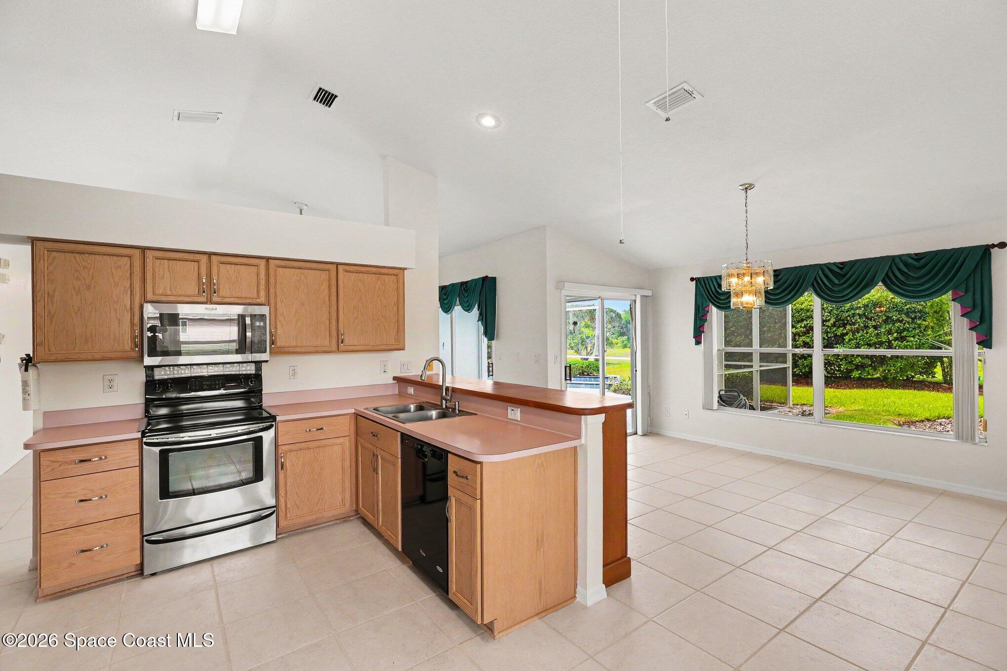 1230 Meadowbrook Road Northeast Palm Bay, FL 32905 - Photo 8 of 43 Kitchen