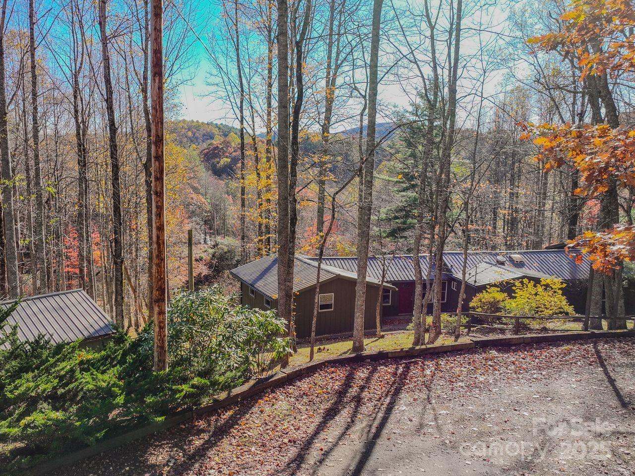 2626 Dendy Orchard Road Highlands, NC 28741 - Photo 2 of 33 a view of a pathway with a yard