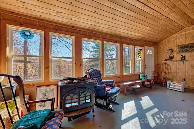 a view of a chairs and table in the patio