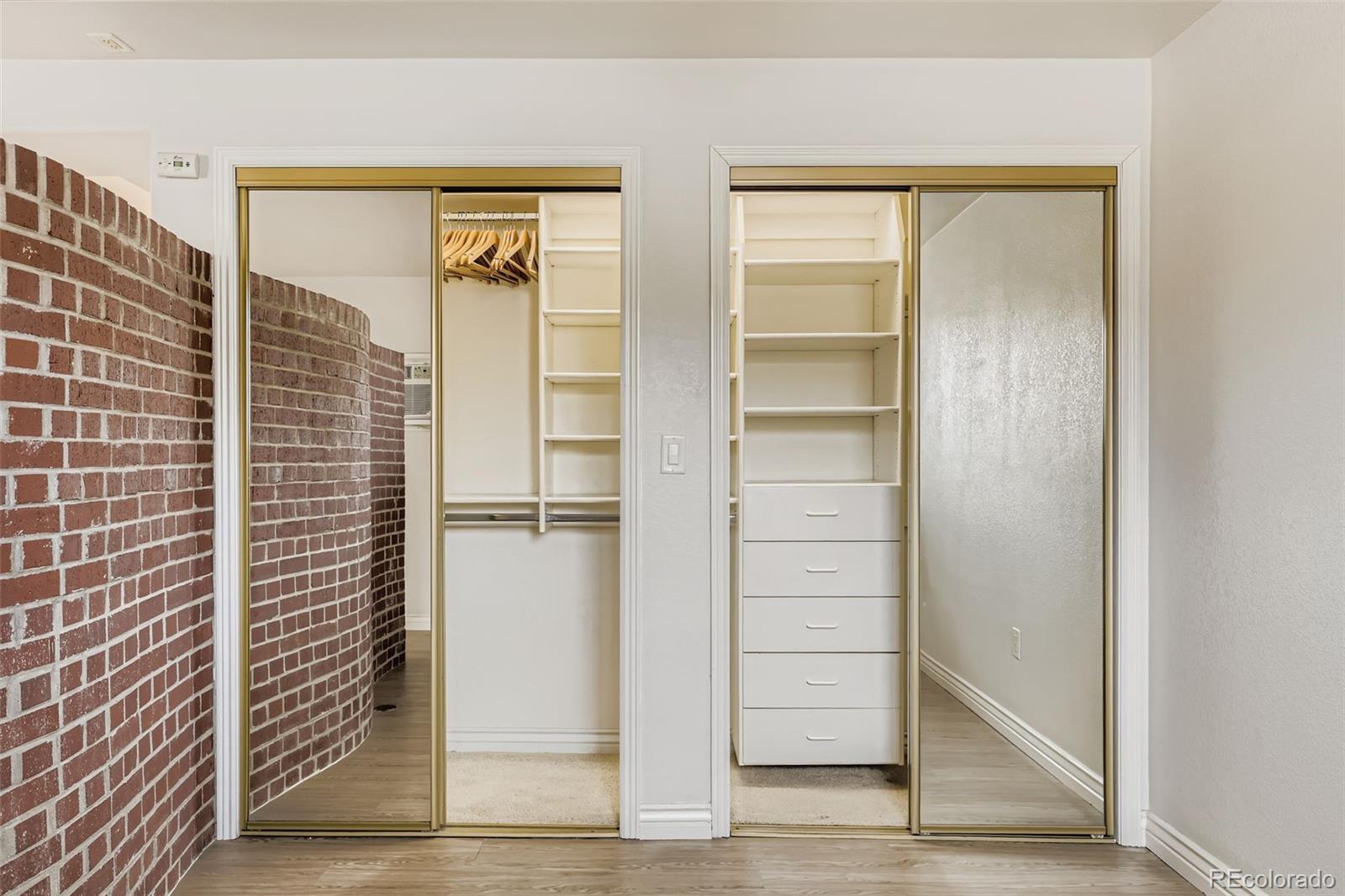 1833 North Williams Street, Unit 206 Denver, CO 80218 - Photo 15 of 29 a view of walk in closet with empty racks