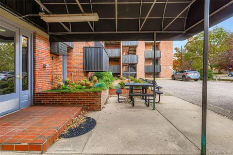 a view of backyard with outdoor seating