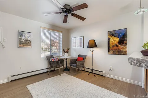 a living room with furniture and window