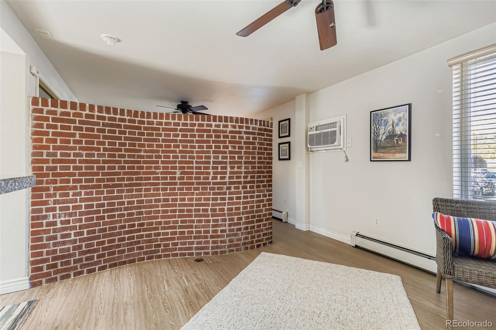1833 North Williams Street, Unit 206 Denver, CO 80218 - Photo 10 of 29 a view of wooden floor with a bathroom