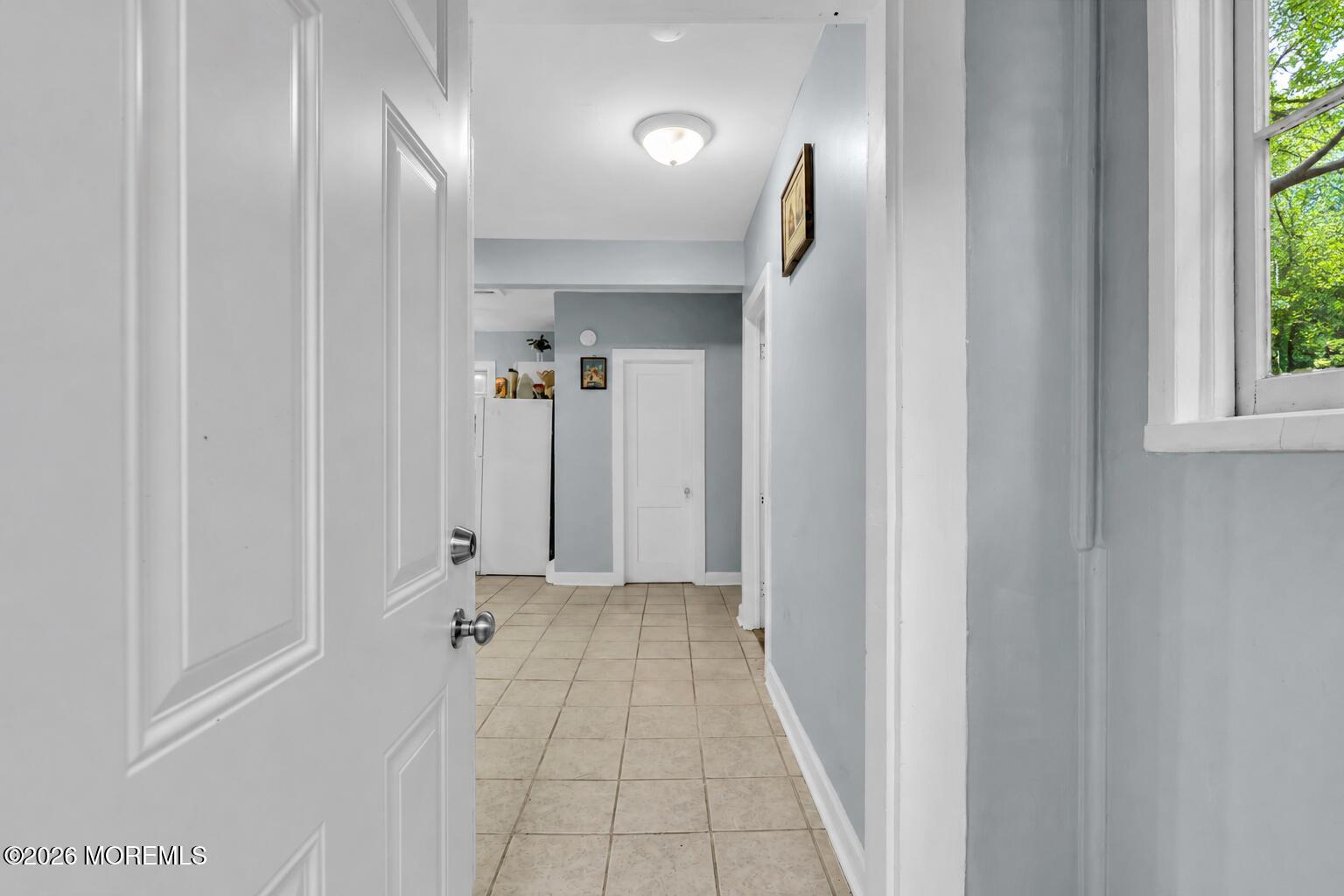 269 Alexander Avenue Howell, NJ 07731 - Photo 17 of 43 a view of a hallway with a window