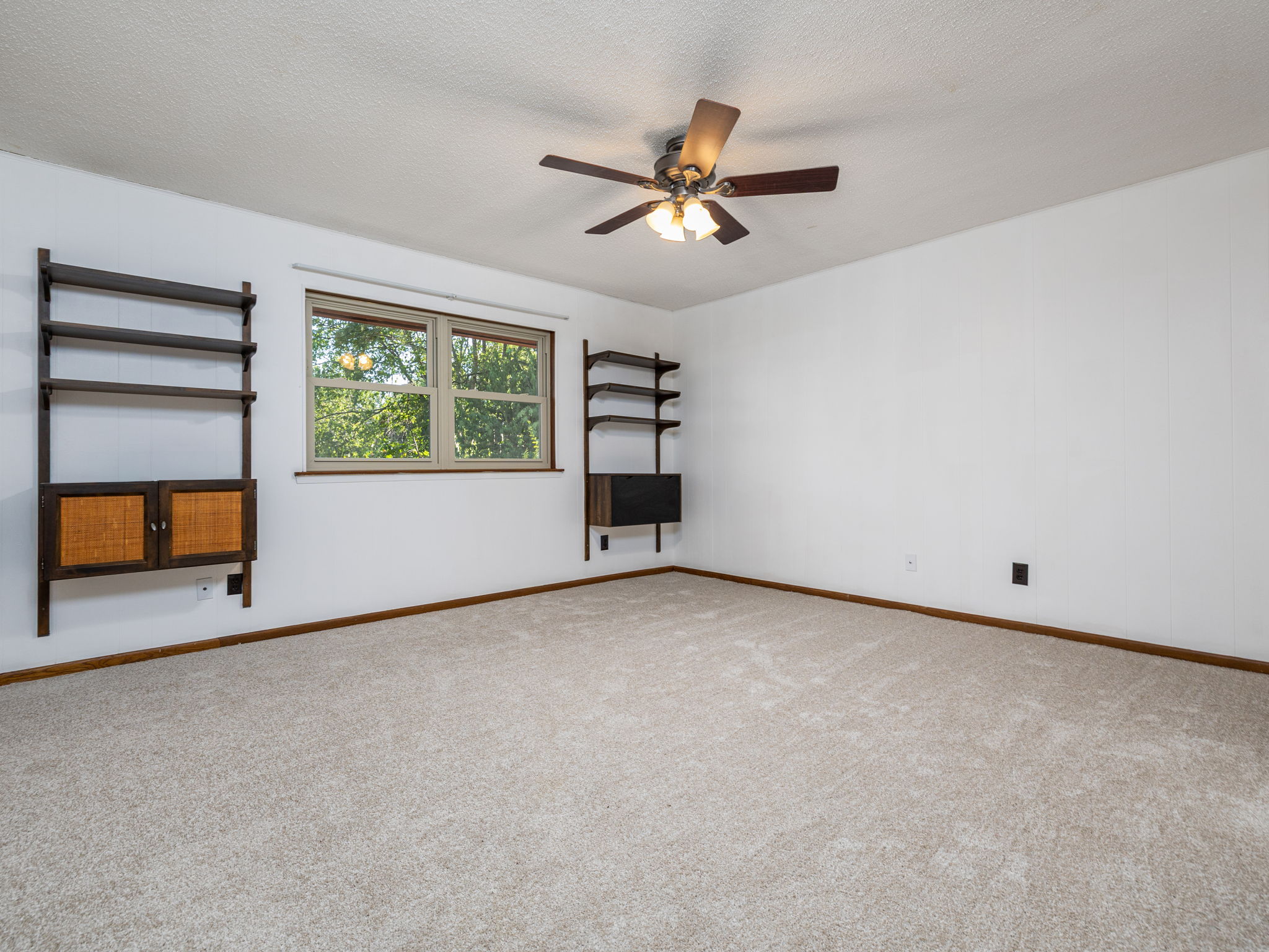 806 Country Club Road Georgetown, TX 78628 - Photo 31 of 39 In the oversized third bedroom you will find some more charming features original to the home. Built in desks offer a versatile space for homework or work from home office