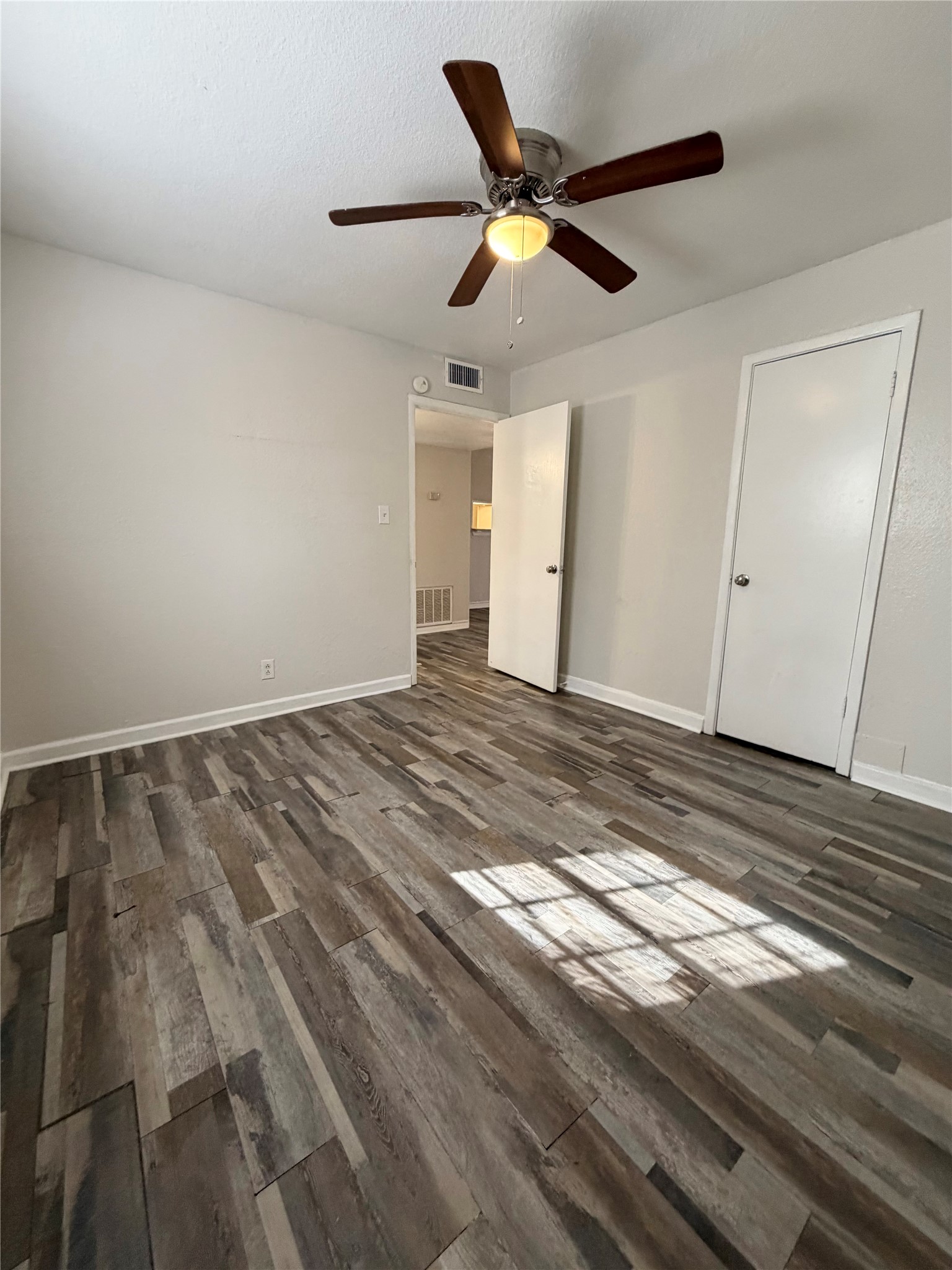 1614 Vauthier Street, Unit 11 La Marque, TX 77568 - Photo 12 of 16 a view of room with wooden floor