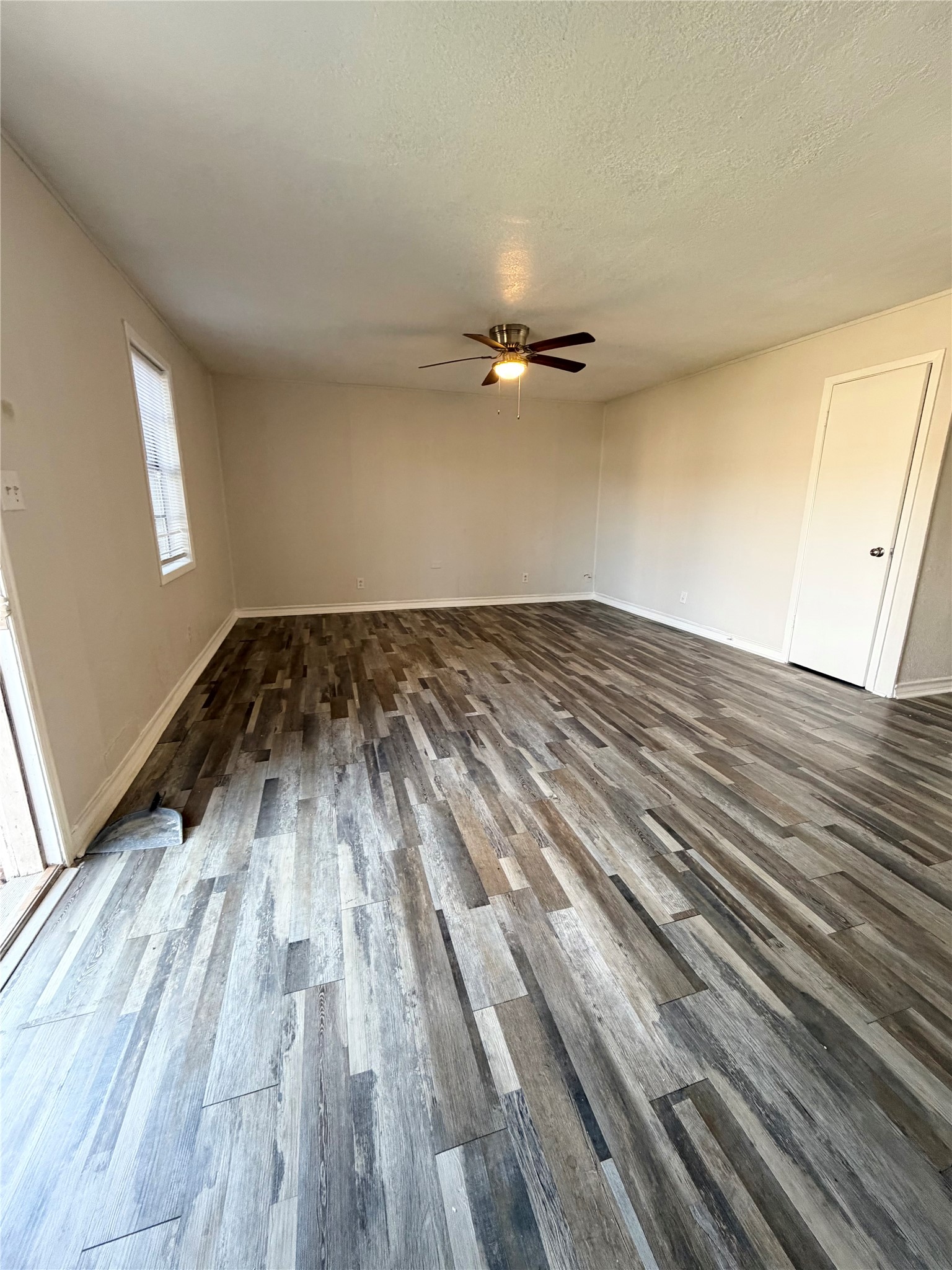 1614 Vauthier Street, Unit 11 La Marque, TX 77568 - Photo 4 of 16 a view of a room with wooden floor