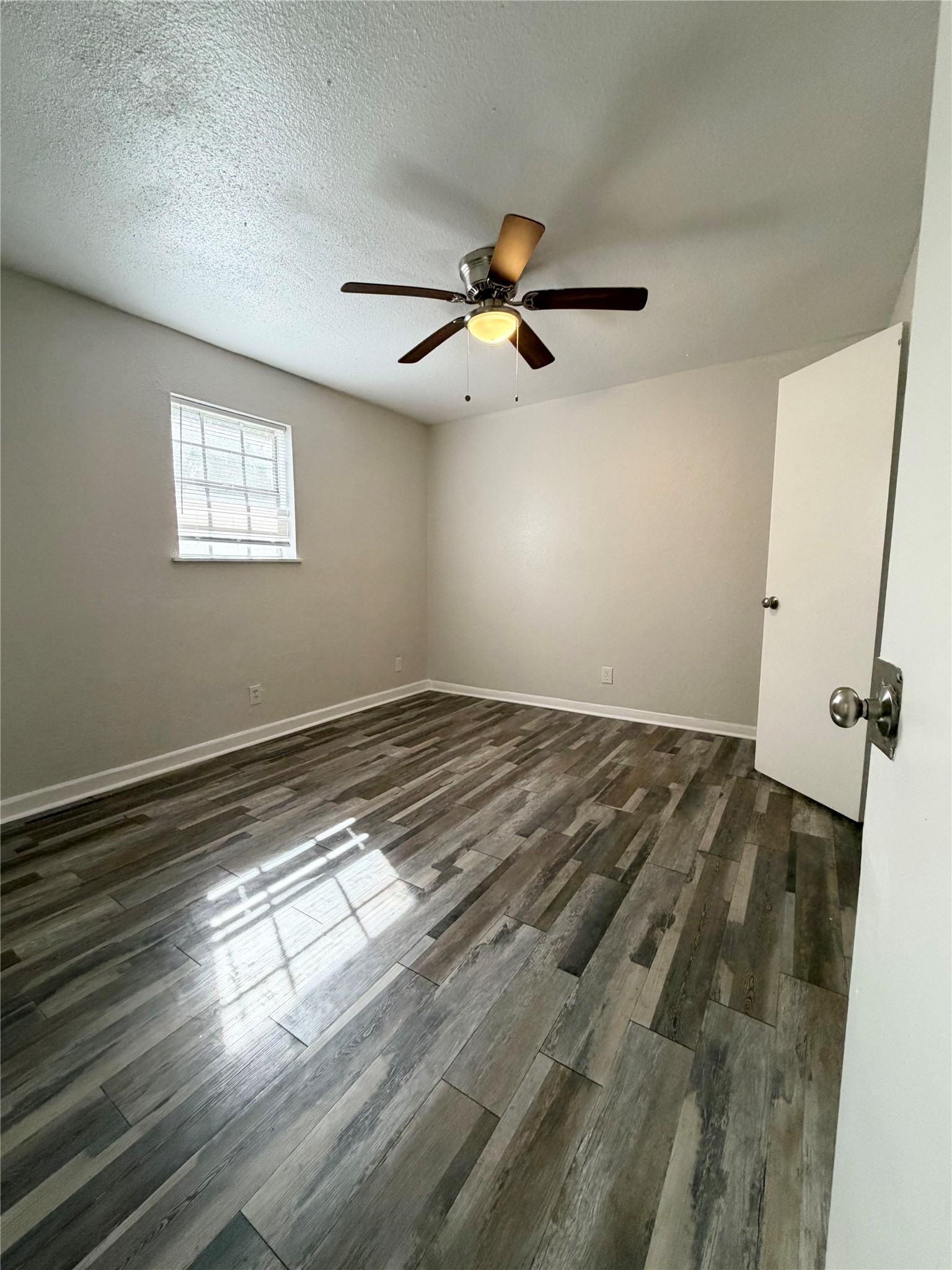 1614 Vauthier Street, Unit 11 La Marque, TX 77568 - Photo 9 of 16 a view of empty room with wooden floor