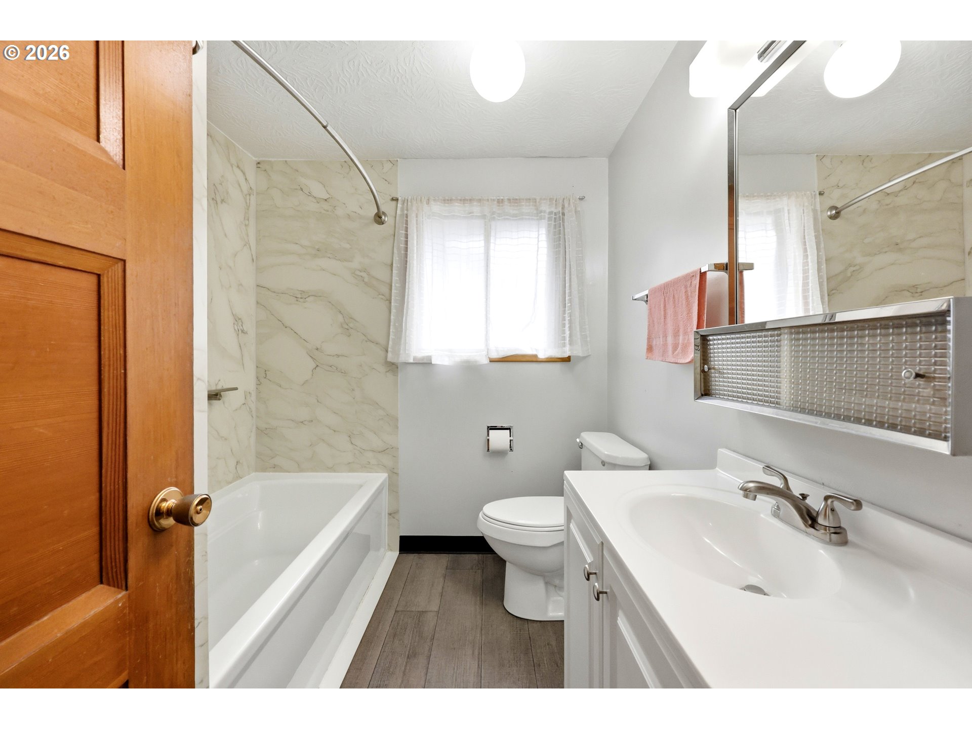 3003 Southeast 162nd Avenue Portland, OR 97236 - Photo 10 of 41 a bathroom with a sink toilet tub and shower