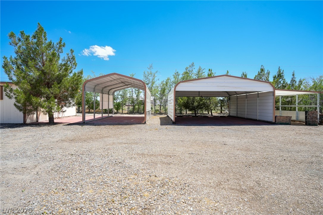 1831 West Horn Road Pahrump, NV 89048 - Photo 38 of 59 Ample parking and storage space are provided by these two sturdy carports.