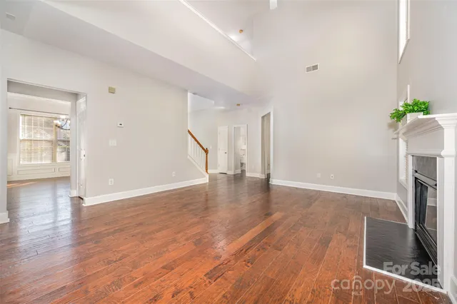 a view of livingroom with hardwood floor and a ceiling fan
