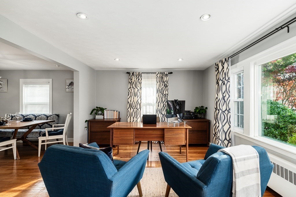 37 Tufts Road Winchester, MA 01890 - Photo 2 of 39 a living room with furniture a large window and a dining table