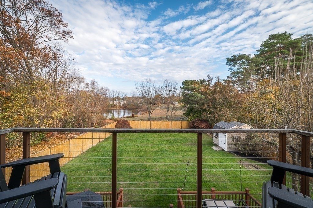 37 Tufts Road Winchester, MA 01890 - Photo 22 of 39 a view of a balcony next to a lake view