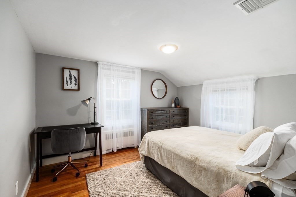 37 Tufts Road Winchester, MA 01890 - Photo 24 of 39 a bed room with a bed and a chair