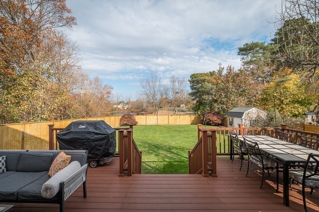 37 Tufts Road Winchester, MA 01890 - Photo 33 of 39 a view of a chairs and table on the wooden floor