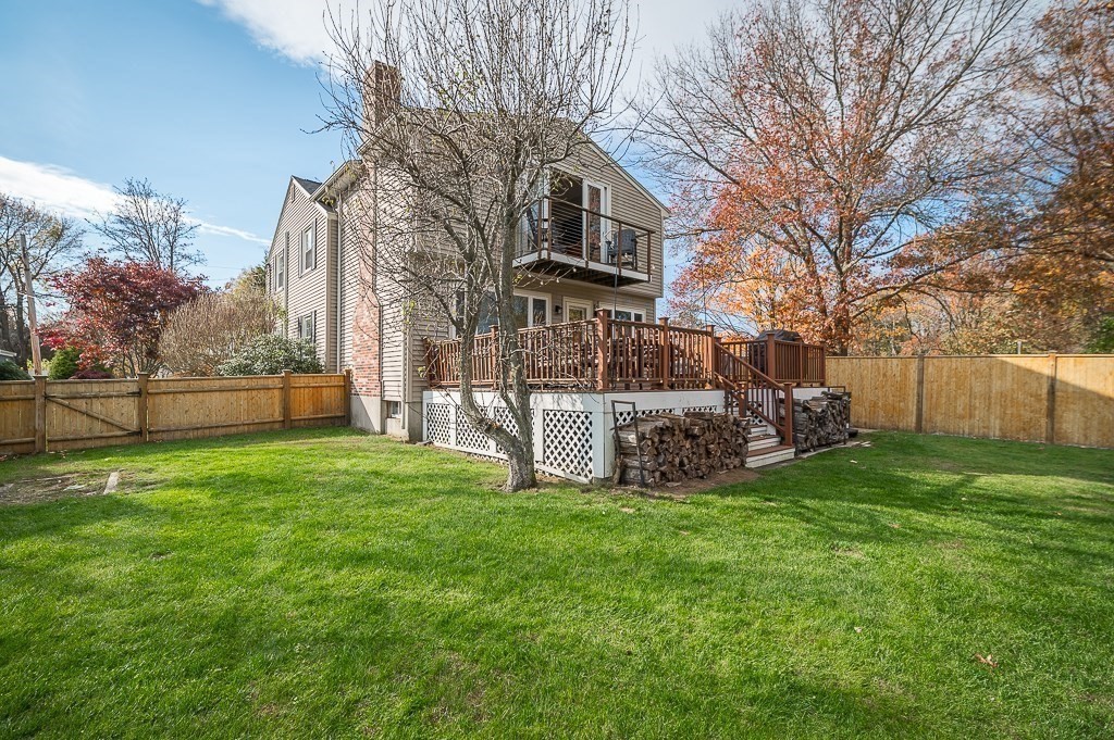 37 Tufts Road Winchester, MA 01890 - Photo 34 of 39 a view of a house with a yard and a fence