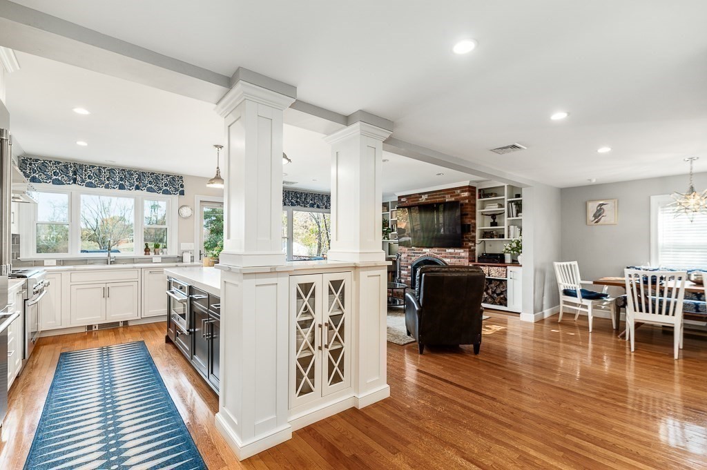 37 Tufts Road Winchester, MA 01890 - Photo 4 of 39 a view of a living room kitchen and a wooden floor