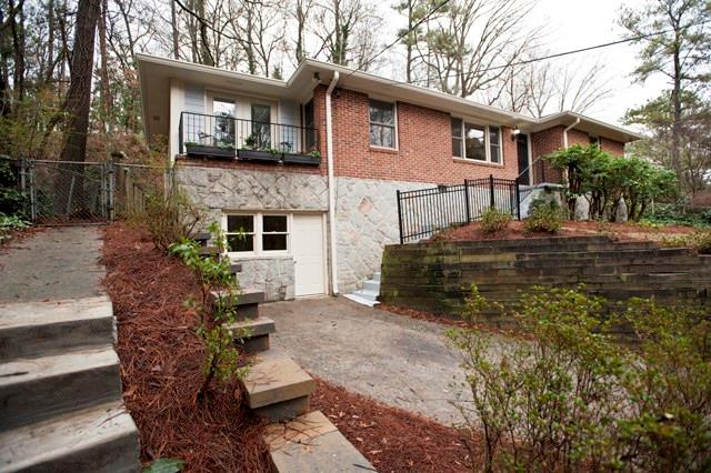 1020 Latham Road Decatur, GA 30033 - Photo 1 of 1 Solid 1950's ranch with the horizontal lines characteristic of mid-century homes. Granite foundation. Daylight basement at driveway level.