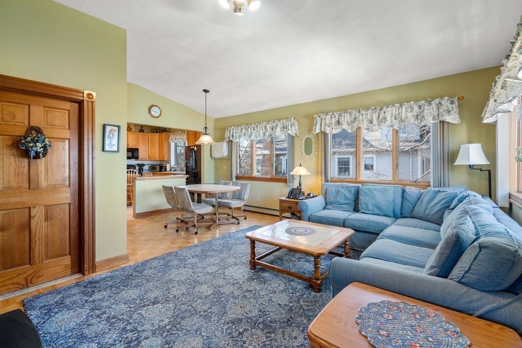 11 Jenison Street Newton, MA 02460 - Photo 12 of 42 a living room with furniture and a large window
