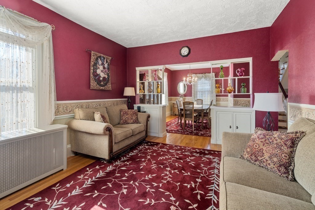 11 Jenison Street Newton, MA 02460 - Photo 14 of 42 a living room with furniture and a rug