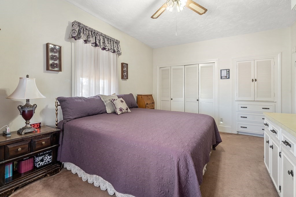 11 Jenison Street Newton, MA 02460 - Photo 19 of 42 a bedroom with a bed and a closet