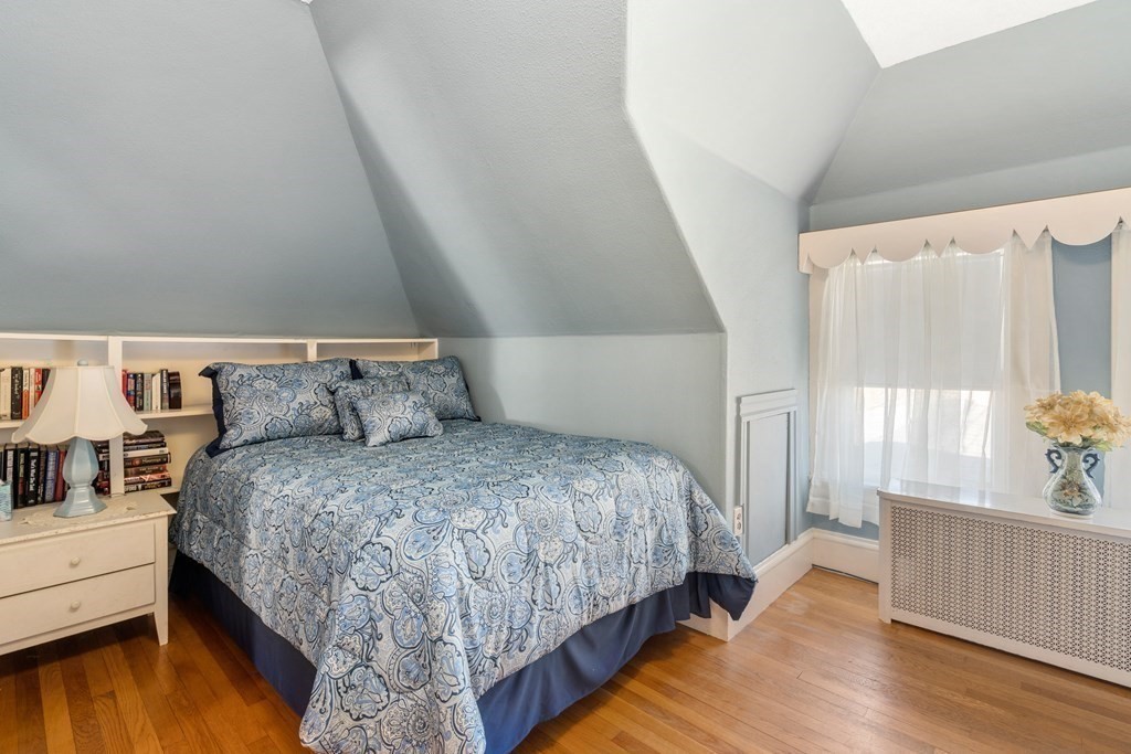 11 Jenison Street Newton, MA 02460 - Photo 22 of 42 a bedroom with bed and window