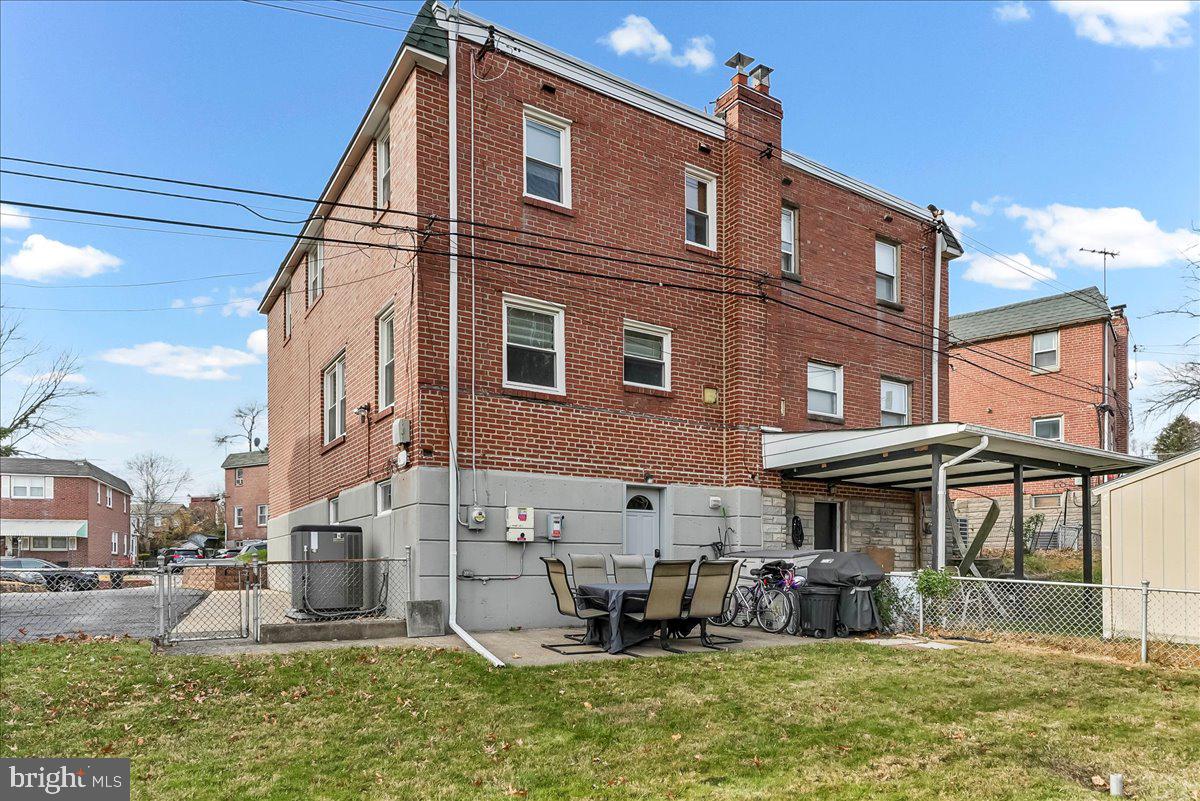 311 Laurel Road Sharon Hill, PA 19079 - Photo 27 of 28 a front view of a building with garden