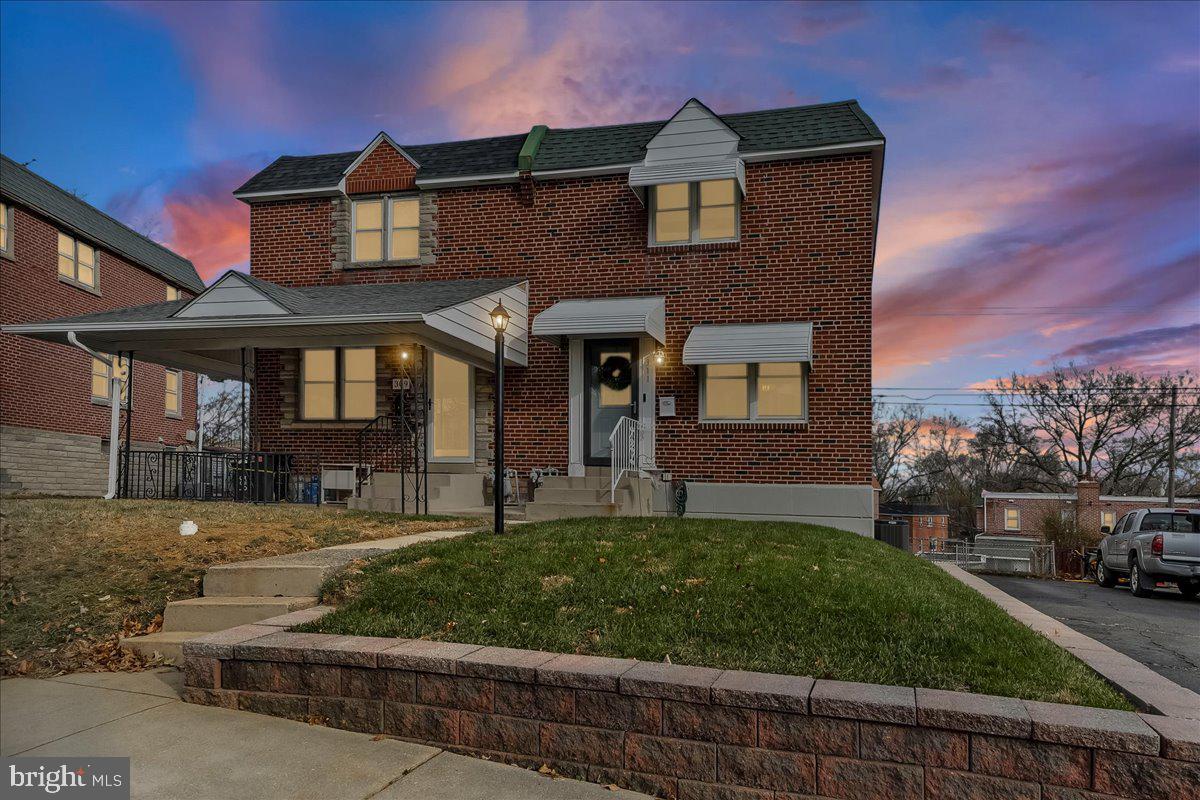 311 Laurel Road Sharon Hill, PA 19079 - Photo 3 of 28 a front view of a house with a yard