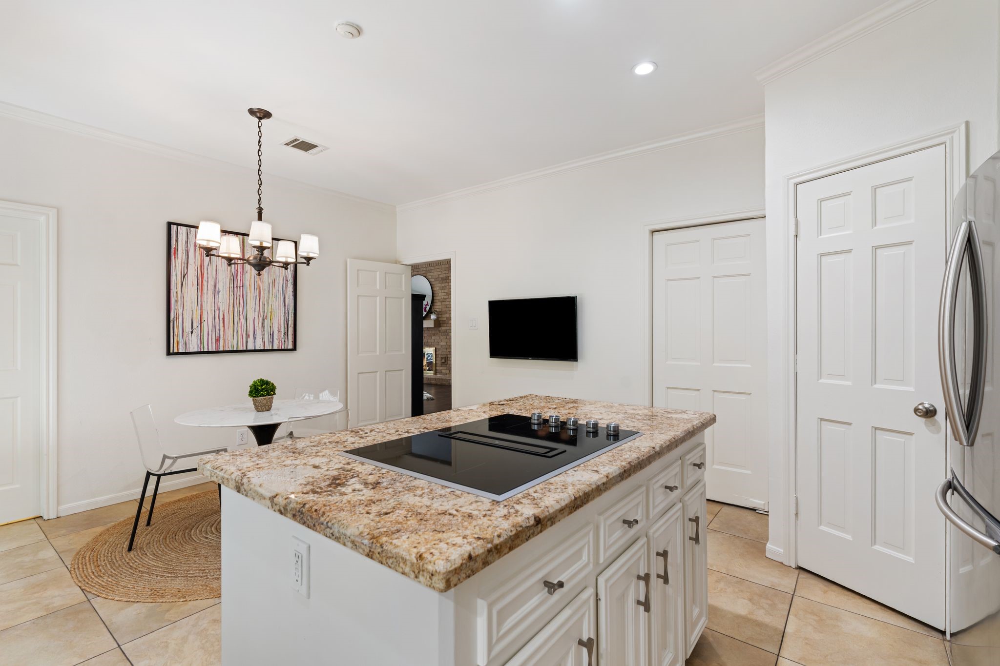 7416 Kelving Street Houston, TX 77030 - Photo 11 of 35 a kitchen that has a sink and a stove in it