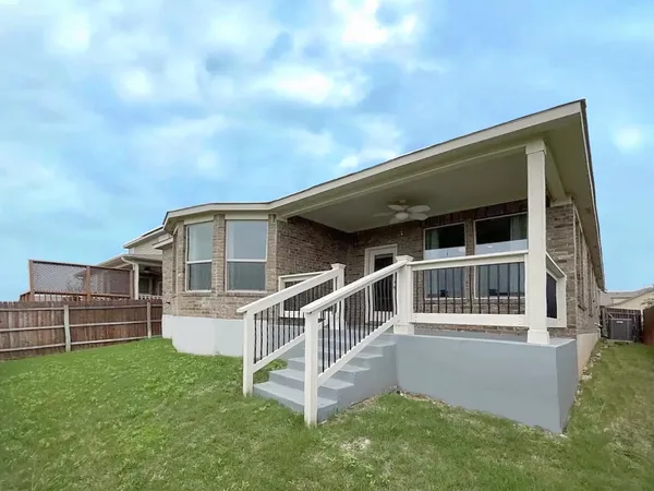 a house view with a garden space